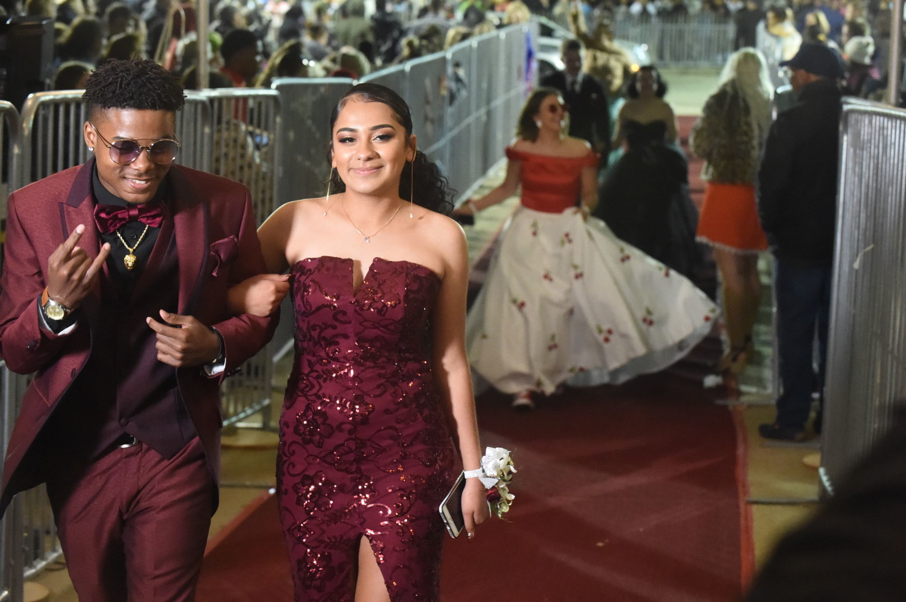 Red carpet, red suit, red dress